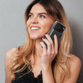 Classic Black double-buckle wallet phone case lifestyle view